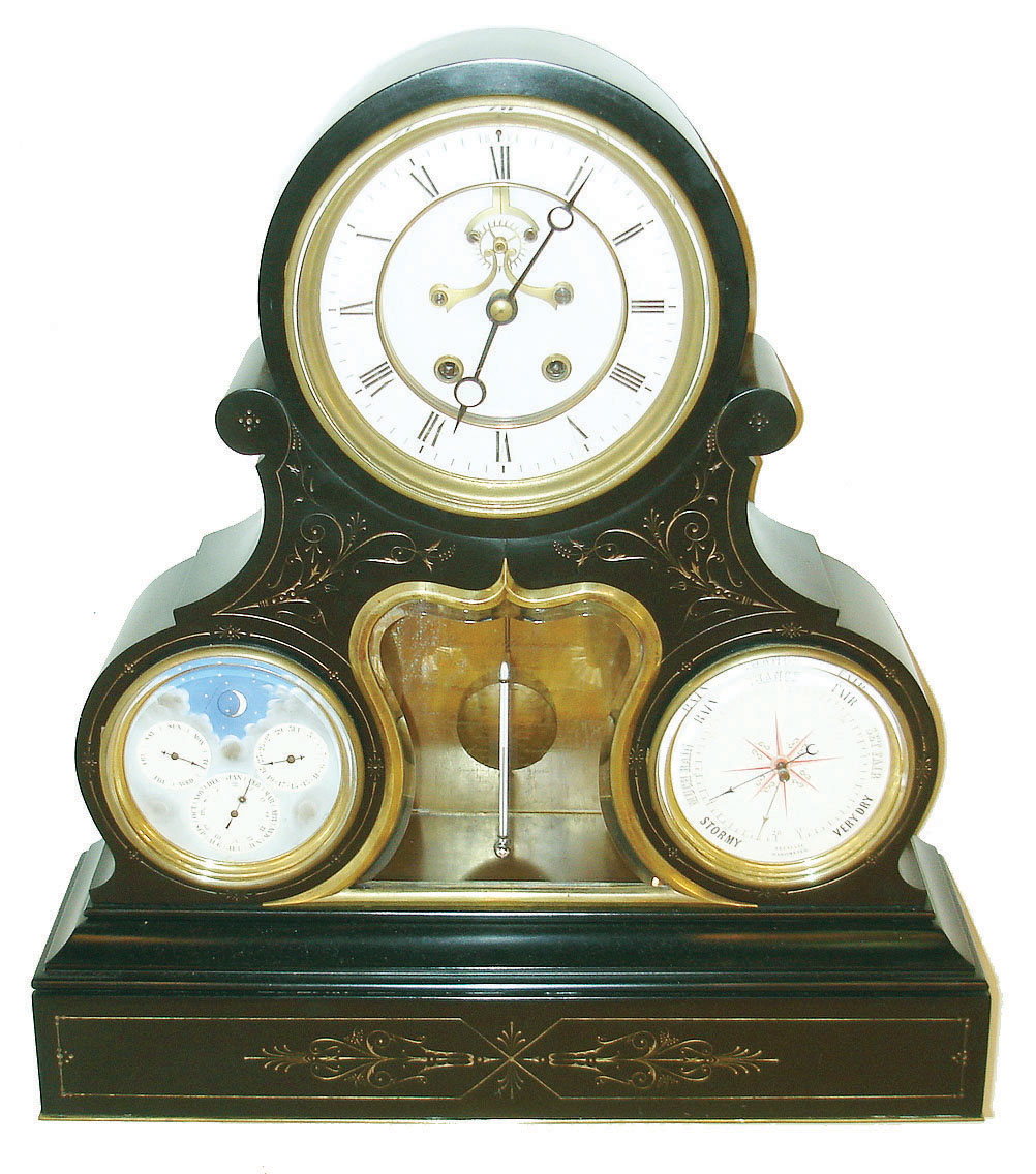 France, monumental black slate mantel clock with perpetual calendar, thermometer and barometer, drumhead case with gilt, incised aesthetic ornament, brass bezel with beveled glass over Roman numeral white enamel dial, Brocot open escapement with carnelian pallets, black painted steel Breguet style hands, enamel perpetual calendar and barometer dials, the calendar with clouds and starry sky, the barometer with red 8 pointed star at center, the central thermometer mounted to a beveled glass with incurved sides and cupids bow top with conforming brass bezel, the thermometer scale engraved on the glass, square 8 day movement marked GV, striking on a bell, rear bezel set with dark violet beveled glass, c1875 — Antique Clocks Price Guide