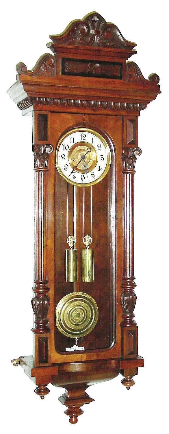 Gustav Becker, Germany, "Vienna Regulator" wall clock, 8 days, time and strike, two weight driven movement in a walnut alt Deutsch case, c1890 — Antique Clocks Price Guide