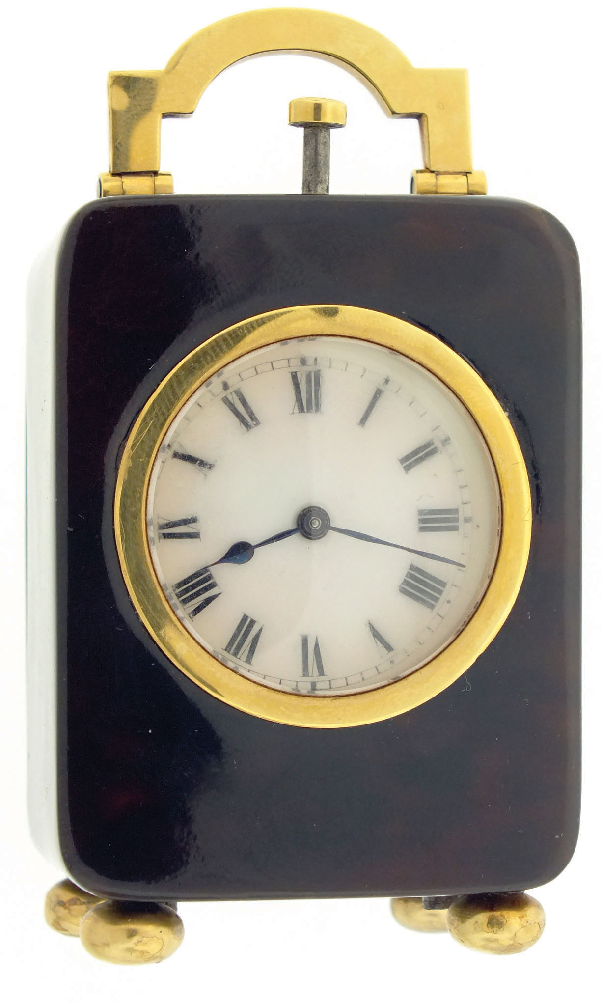 Probably Asprey &amp; Co., London, miniature minute repeating carriage clock, Swiss movement with lever platform and cut bimetallic balance, in tortoise shell case with 18 karat yellow gold hardware, white enamel dial with Roman numerals, blued steel hands, gold mounts marked "A. &amp; Co. Ltd." and with London standard mark and date letter for 1910 — Antique Clocks Price Guide