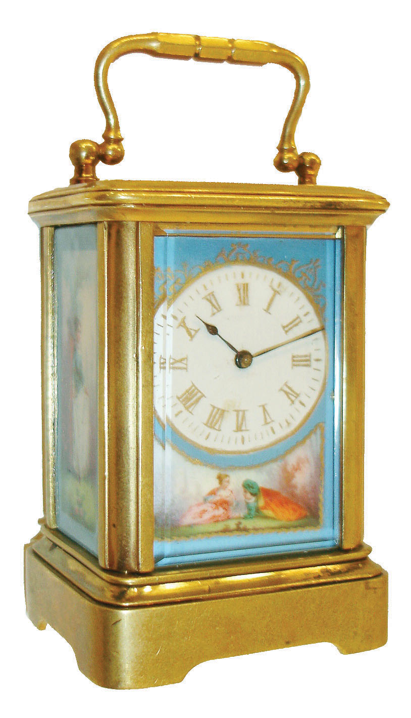 France, for Tiffany &amp; Co., mignonette #1 carriage clock, gilt Corniche case with polychrome decorated porcelain panels, the front with Roman numeral dial surrounded with a gilt border, above a scene with a couple reclining in a landscape, the right panel with a landscape and a boy, the left with a girl in a similar scene, the back flowers and trees, and with buildings in the distance, 8 day time only movement, with lever platform, case signed "Tiffany &amp; Co." on base inside the back door, c1900 — Antique Clocks Price Guide