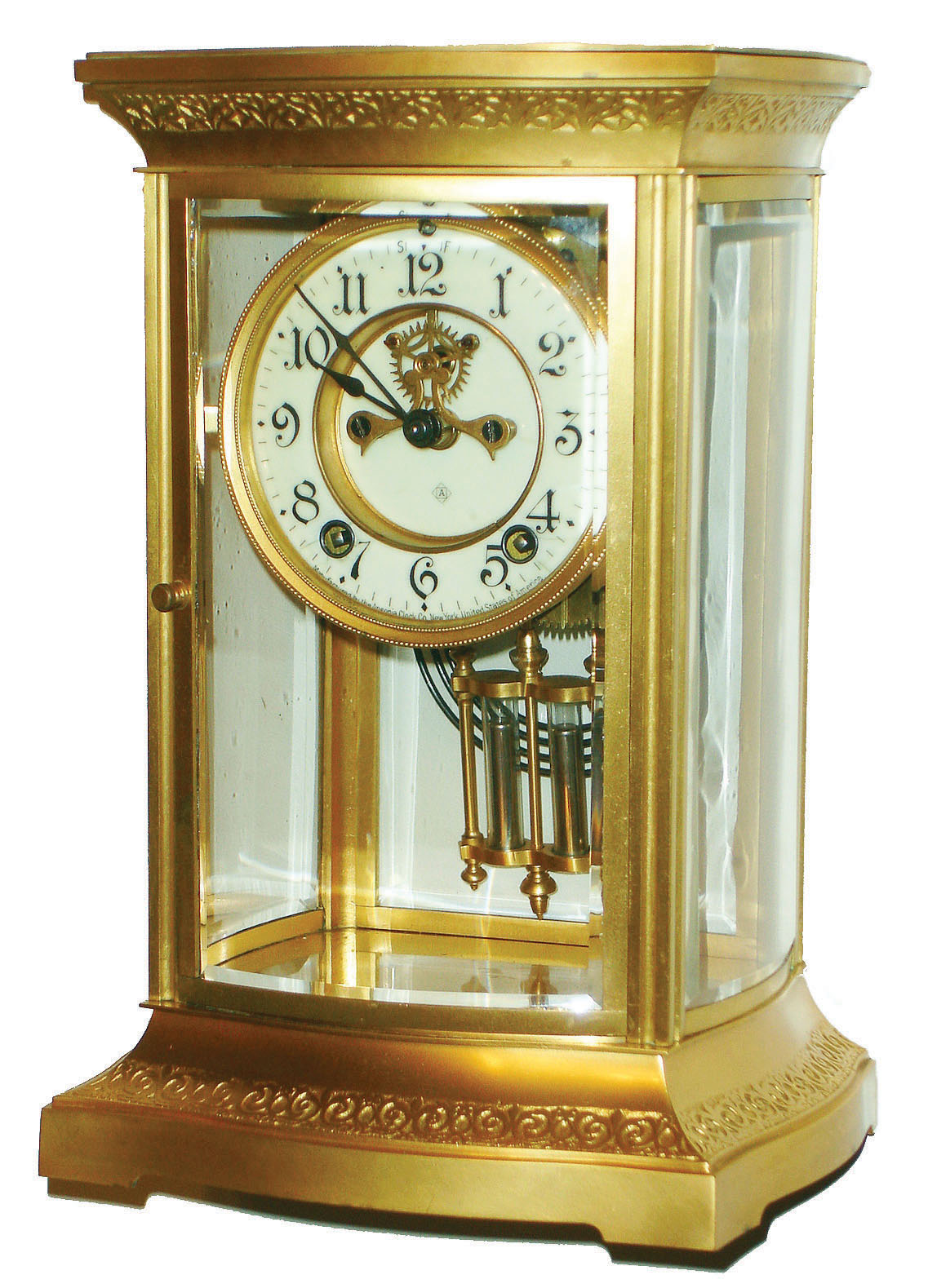 Ansonia Clock Co., New York, "Regis" brass and curved glass 8 day time and strike crystal regulator mantel clock, visible escapement, c1914 — Antique Clocks Price Guide