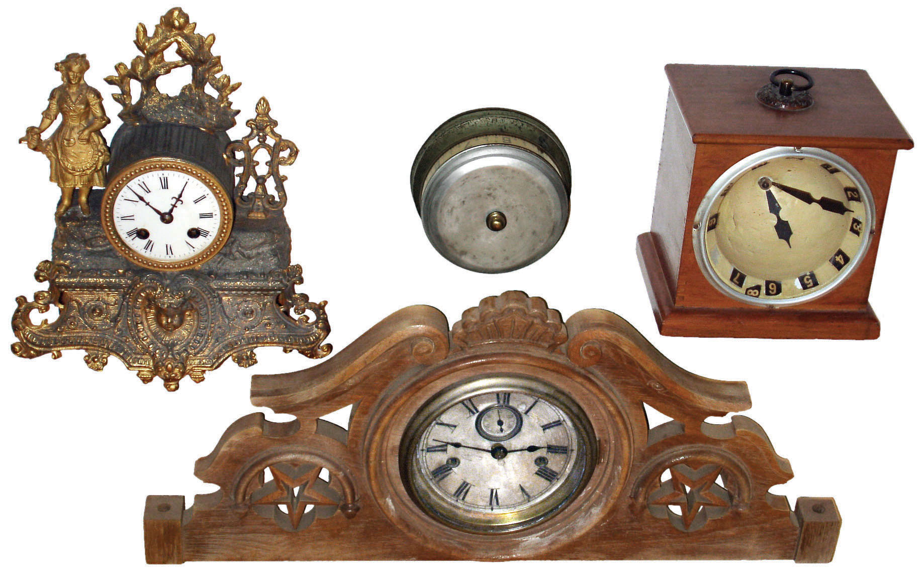 Clocks- 4 (Four): French 8 day time and strike case metal mantel clock; Lux 30 hour tape measure clock; deep dial 30 hour novelty clock; carved wood crest with 8 day Seth Thomas movement in drum; early 20th century. — Antique Clocks Price Guide