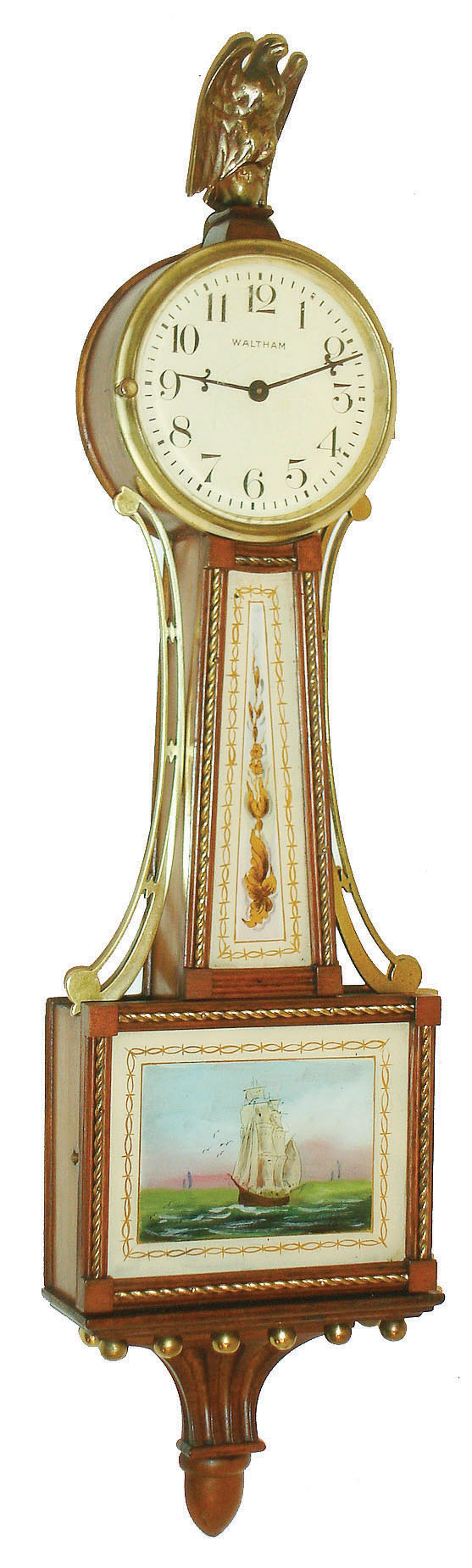 Waltham Clock Co., Waltham, Mass., "Miniature Willard Banjo", 8 days, time only, stem wind, spring driven movement with lever escapement in mahogany case with gilt rope front, reverse painted tablets and painted metal dial, c1930 — Antique Clocks Price Guide