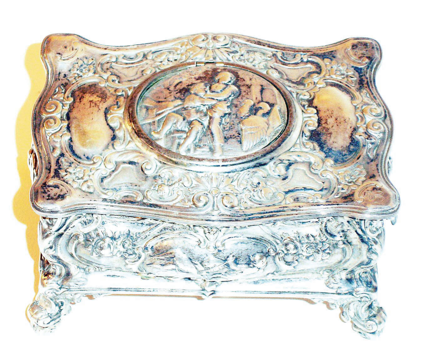 German, Singing Bird Box, in an embossed coin silver case marked 800, key wound, actuated at will, the bird emerging from the box via small pull pin on right side of case, c1980 — Antique Clocks Price Guide