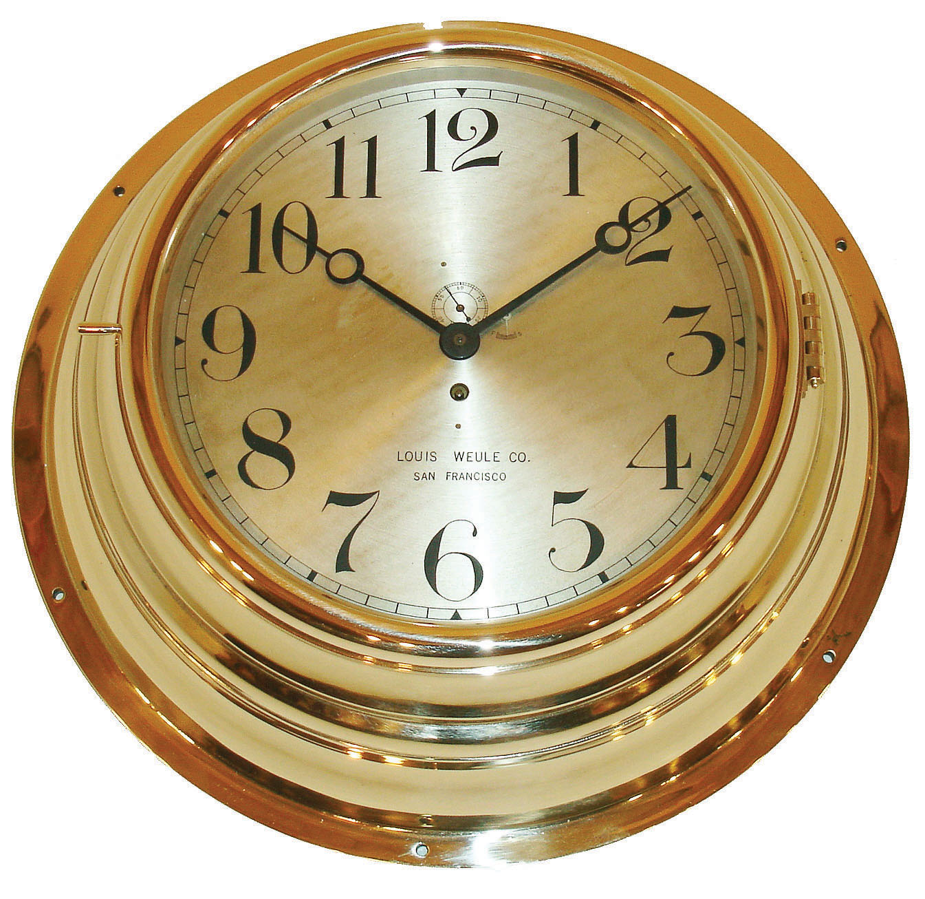 Chelsea Clock Co., Chelsea, Mass., rare "Wardroom" model, massive polished cast bronze case, the sides with ogee, ovolo and cavetto moldings, and finished with a half round section bezel, 12 inch Arabic numeral silvered dial with circular graining and small seconds just above the center arbor, and signed "Louis Weule Co. San Francisco", blued steel moon hands, 8 day time only movement, serial #72164, c1912 — Antique Clocks Price Guide