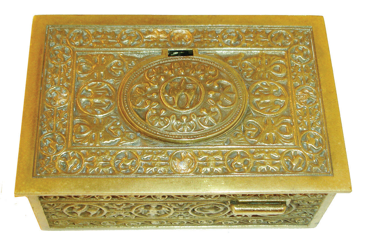 Germany, singing bird box, cast brass case decorated with mythical beasts and scrolled vines, the bird emerging from the box when the lever is pushed, performs for his audience, and then disappears from view, c1980 — Antique Clocks Price Guide