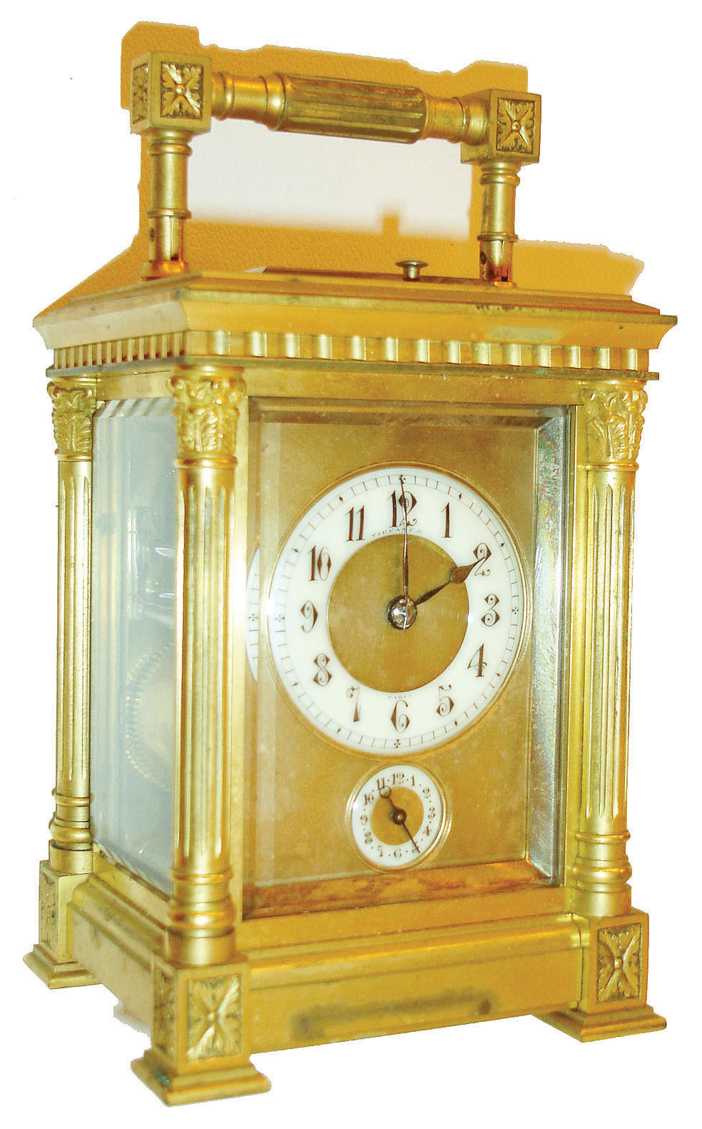 Henri Jacot, France, for Tiffany &amp; Co., Paris, carriage clock, gilt brass Anglaise Riche variant case with beveled glasses, the rear glass with nicely engraved cipher, gilt dial mask with Arabic numeral white enamel time and alarm dials, blued steel hands, 8 day brass movement striking on gongs, grand sonnerie in passing, and repeating at will, with lever escapement platform, the back plate with HJ and parrot mark, #5942, c1890 — Antique Clocks Price Guide