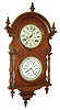 Welch, Spring & Co., Forestville, Conn., "Wagner B.W. Hanging", 8 day, time and strike B.B. Lewis double dial calendar wall clock, c1878  This model was made for the Spanish market.