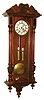 Gustav Becker, Freiburg, Germany, Vienna regulator wall clock, 8 days, time and strike. two brass weight driven movement in a walnut and walnut veneer case with two part white enamel dial and second's bit, serial #367788 c1900
