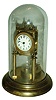 German, Jahresuhrenfabrik, 400 Day mantel clock with porcelain dial and glass dome, disc pendulum, dial signed Urania, c1908