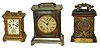 Clocks- 3 (Three) small metal and wood 30-hour carriage clocks: British United with Leeds Hospital 1893 presentation; Ansonia fancy alarm; Seth Thomas alarm