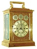 H. Pleister, 277 Regent St., London, giant carriage clock with perpetual calendar, large 8 day, two train fusee movement, gilt platform with spring detent escapement and free sprung cut bimetallic chronometer balance with blued helical spring, counting the hours on a large gong and with a single blow at the half hour, the back plate with small aperture for viewing seconds disk attached to contrate wheel arbor, silvered dial with gilt mask signed "Dent London", the day of the week, month, and date displayed on 3 small dials arranged above the time dial, blued steel Breguet style hands, narrow blued steel hands for the calendar functions, all contained in a polished, gilt brass case with carrying handle, with thick, beveled glass panels, Ht. 14 1/4" to top of handle, c1870