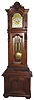 Austrian, Long Duration, floor standing "Vienna Regulator", 2-weight, time and strike, with an engraved arched dial, and with matching engraved weights, pendulum and pulleys, appearing to run and strike for 9 to 12 months on a single wind, c1890.