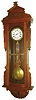 New Haven Clock Co., New Haven, Conn., "Regulator No. 9" wall clock, 8 days, time only, weight driven Swiss movement with gridiron pendulum, sweep seconds and a pinwheel escapement in a walnut case with white enamel dial and "STANDARD TIME" silk screened on glass, c1883