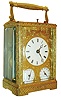 France, for the English market, carriage clock, gilt case and dial mask entirely covered with engraved ornament and set with beveled glasses, the turned handle also engraved, Roman numeral white enamel dial shows the time, above Arabic numeral dials for alarm and calendar displays, blued steel Breguet style hands, week going brass movement with engraved back plate, striking grand and petit sonnerie on two bells, the striking without dead blow between hours and quarters, lever for selection of strike mode on back plate, and with alarm and date, gilt lever platform with engraved balance cock and steel balance, center arbor with ratchet and click to prevent turning the hands backward, back plate marked 1846 15 12, c1850