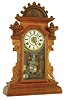 Waterbury Clock Co., Waterbury, Conn., "Hudson", 8 day, time, strike and alarm walnut mantel clock, c1893