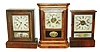 Clocks- 3 (Three): a (1) Welch 30 hour time and strike cottage and (2) a Gilbert 30 hour time and strike cottage and (3) a Seth Thomas 30 hour time and strike small shelf clock.