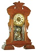 William L. Gilbert Clock Co., Winsted, Conn., "Stork", 8 day, time, strike and alarm walnut mantel clock, c1885
