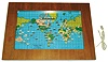 World Time Corp. electric illuminated world map clock, sold by Howard Miller, U.S.A., hardwood veneer over plywood, with glass face, copyright 1959