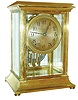 Seth Thomas Clock Co., Thomaston, Conn., for A. Stowell & Co., crystal regulator, "Empire No. 303", Arabic numeral silvered dial, blued steel hands, round 8 day time and strike movement, with simulated mercury pendulum, c1920