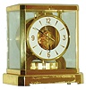 Jaeger - LeCoultre, Switzerland, Atmos clock, 15 jewel gilt caliber 528-8 movement, gilt torsion pendulum, round white painted dial with applied gilt Arabic numerals and arrow markers, gilt hands with back tips, contained in a glazed rectangular case with removable front panel, 9 1/4" h, serial #391415