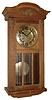 Clocks- 2 (Two) German 8 day time and strike clocks: unsigned oak wall clock; inlaid mahogany mantel clock; early 20th century