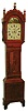 English tall clock, 8 days, time, calendar and strike, weight driven brass movement in a mahogany and crotch mahogany inlaid case with high bracket feet and rope turned columns flanking hood and painted iron dial, c1820