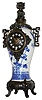 French, for the Oriental market, porcelain and bronze 8 day time and strike urn-form mantel clock, c1880