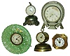 Clocks- 5 (Five) small metal and glass 30 hour novelty clocks: Lenzkirch alarm; Parker; Waterbury; Welch "Good Luck" horseshoe and pressed green glass; early 20th century