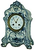French Delft style 8 day time and strike porcelain mantel clock, A.D. Mougin works, c1900