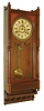 Seth Thomas Clock Co., Thomaston, Conn., "Queen Anne" wall clock case now fitted with a different dial and an Ansonia 8 day, time and strike spring brass movement wall clock, c1880