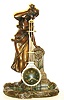 French, Le Roy & Cie, Mysterious timepiece, the movement contained within the ball of the pendulum and causing the pendulum to swing WITHOUT apparent impulse, the clock suspended from a patinated spelter female statue, leaning over a pond next to a fountain, with Paris foundry mark on the rear, c1885