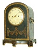 England, paper mache bracket clock, the Japanned case with a repeating, gilt leaf border, the front with floral swags, front of base with trailing vine and edged with a gilt line, case sides with trophies, top with central patera and floral sprays, cast brass carrying handles, brass bezel with convex glass, Arabic numeral, white painted sheet iron dial, brass hands, two train week going fusee movement with decorative engraving on back plate and pendulum, #213, c1820