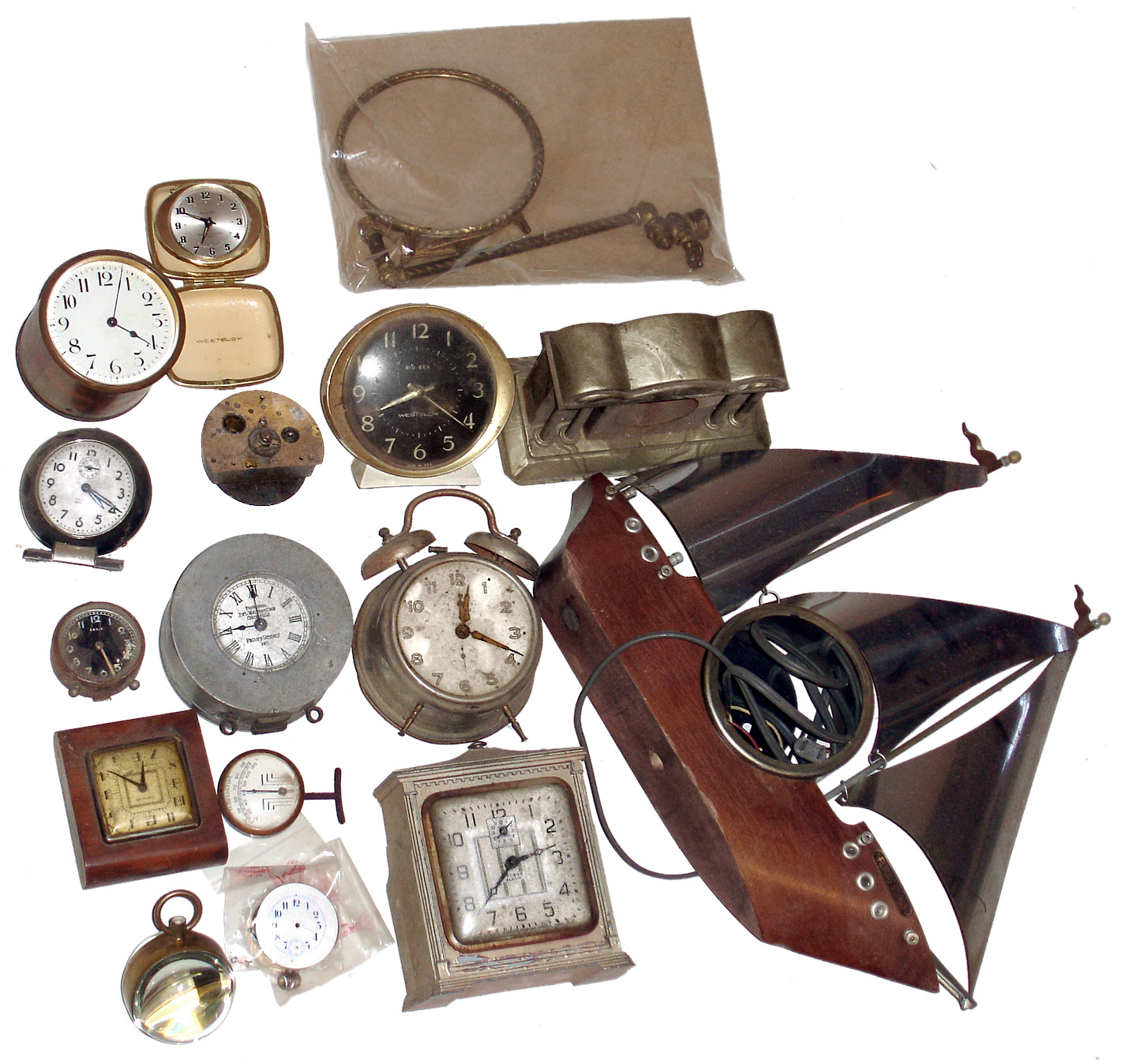 Small clocks lot including watchman's and glass paperweight, early 20th century. — Antique Clocks Price Guide