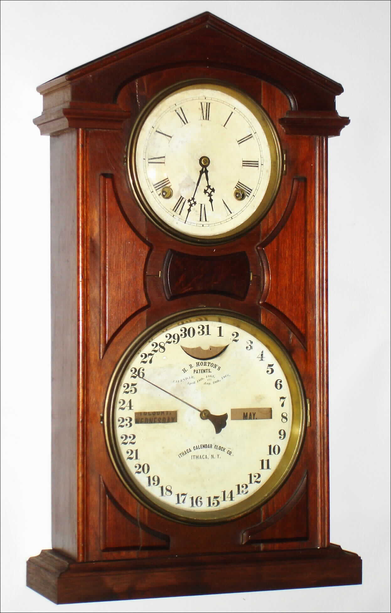 Ithaca Calendar Clock Co., Ithaca, NY, "No. 7 Shelf Cottage" walnut 8 day, time and strike double dial calendar clock, c1874 — Antique Clocks Price Guide