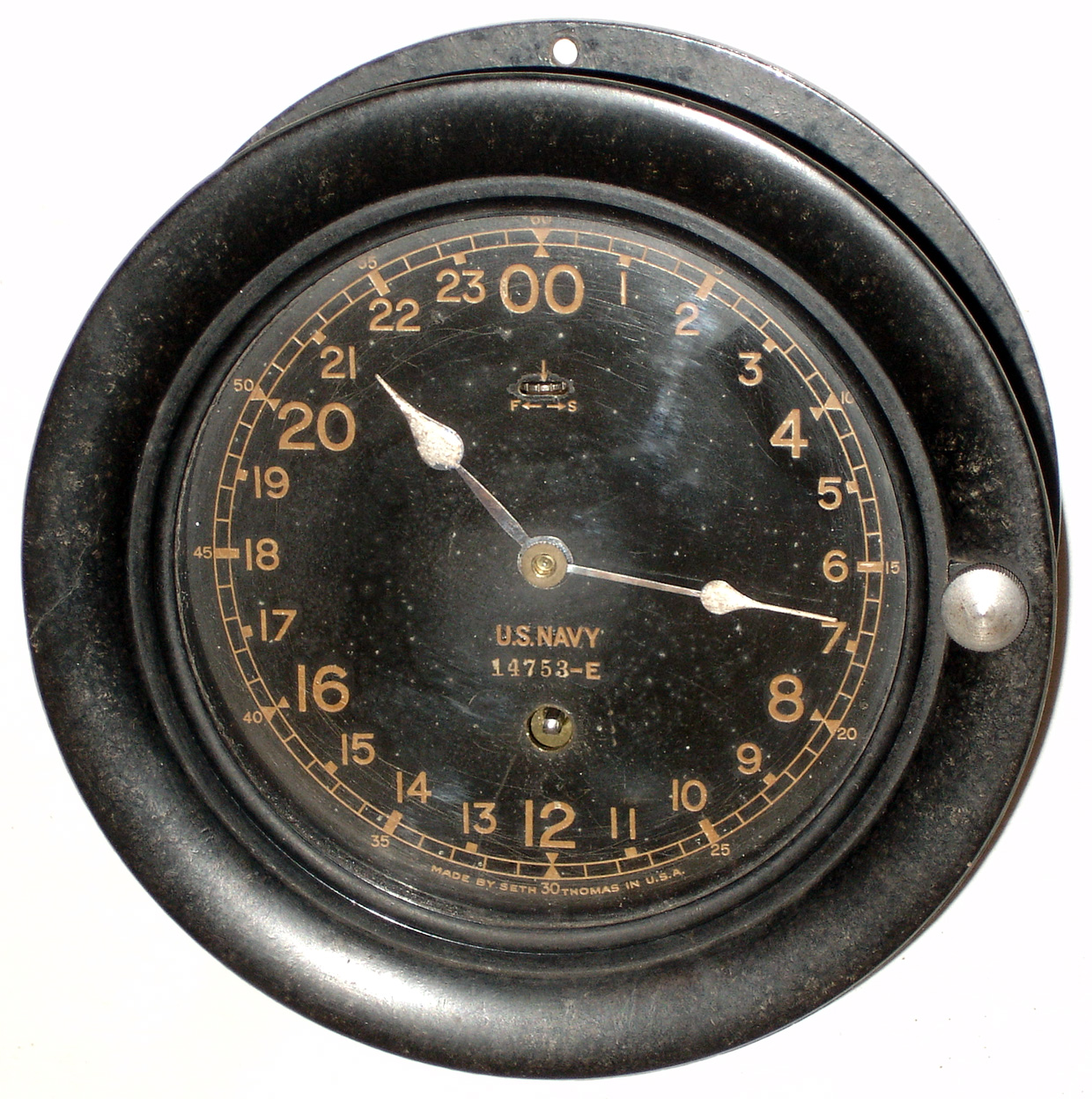 Seth Thomas Clock Co., Thomaston, Conn., U.S. Navy, 8 day 5" dial marine clock in black phenolic case, 1942 — Antique Clocks Price Guide