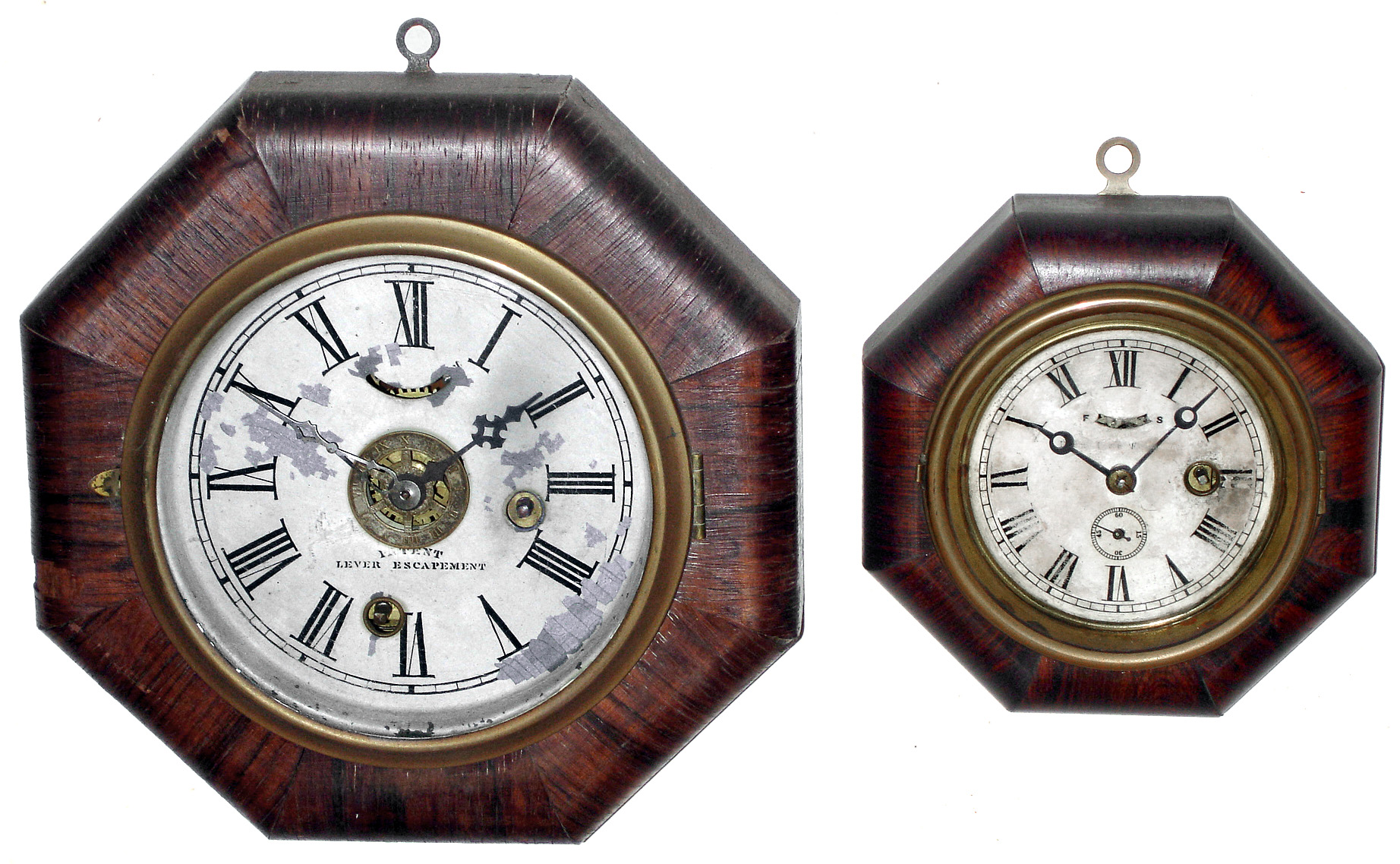 Clocks- 2 (Two) Waterbury Conn. "Octagon Marine" 30 hour: 6" with alarm, 4" with seconds indicator, c1890 — Antique Clocks Price Guide