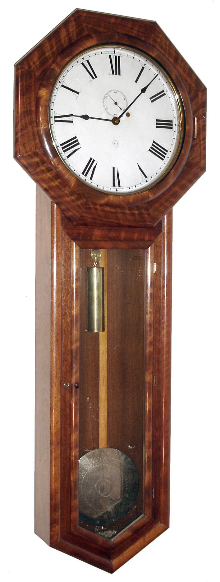 Seth Thomas Clock Co., Thomaston, Conn., "Regulator No. 18" wall clock, 8 day, time only, weight driven movement in well figured walnut case with painted metal dial and finely damascened pendulum bob, c1885 — Antique Clocks Price Guide