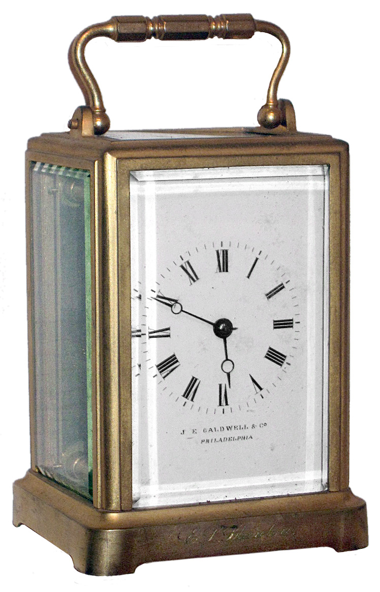 French carriage clock for J.E. Caldwell and Co., Philadelphia, 8 day, time only, spring driven movement in brass and beveled glass corniche style case, c1890 with associated leather travel case — Antique Clocks Price Guide