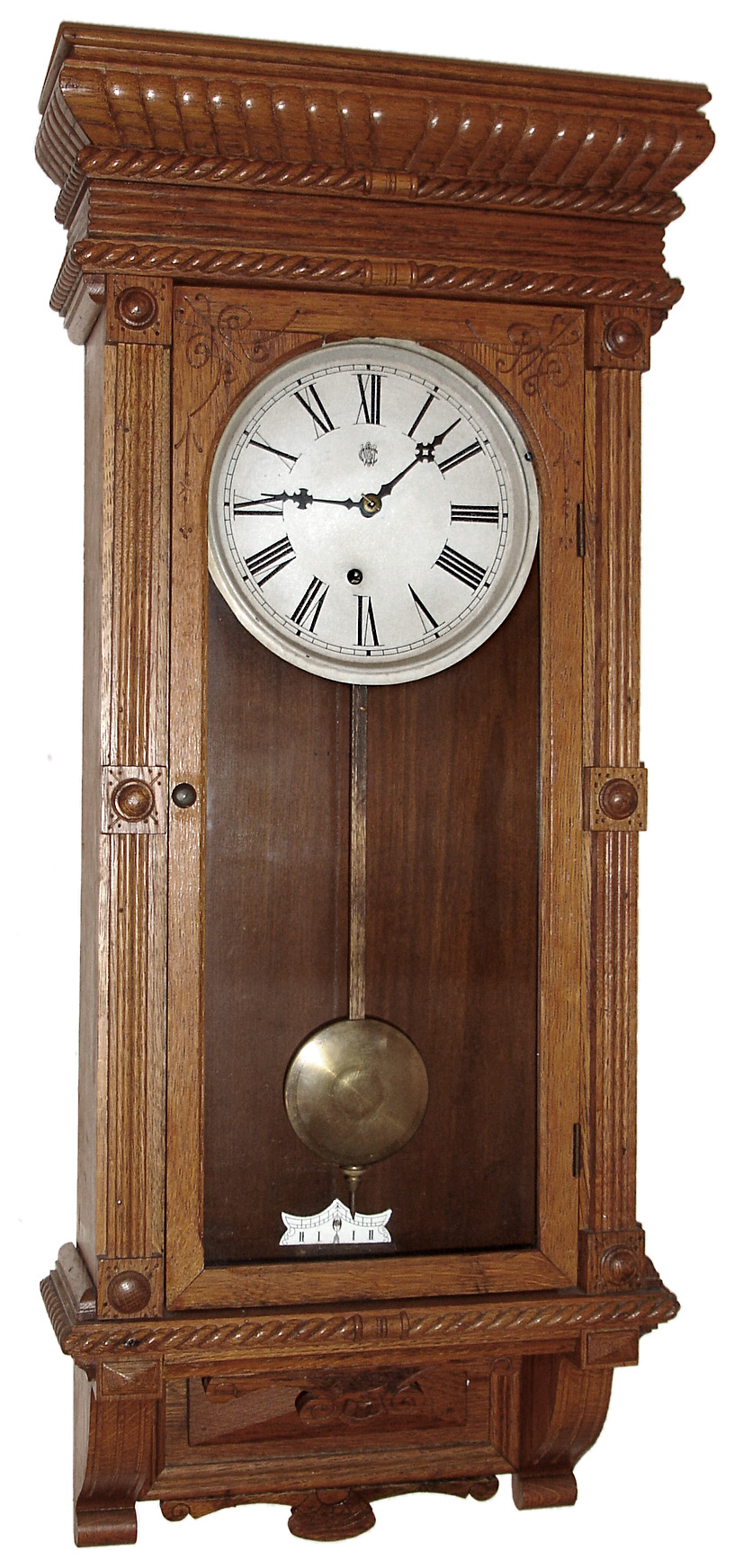 Waterbury Clock Co., Waterbury, Conn., "Leeds" wall clock, 8 day, time only, spring driven movement in an oak case with painted metal dial, c1890 — Antique Clocks Price Guide