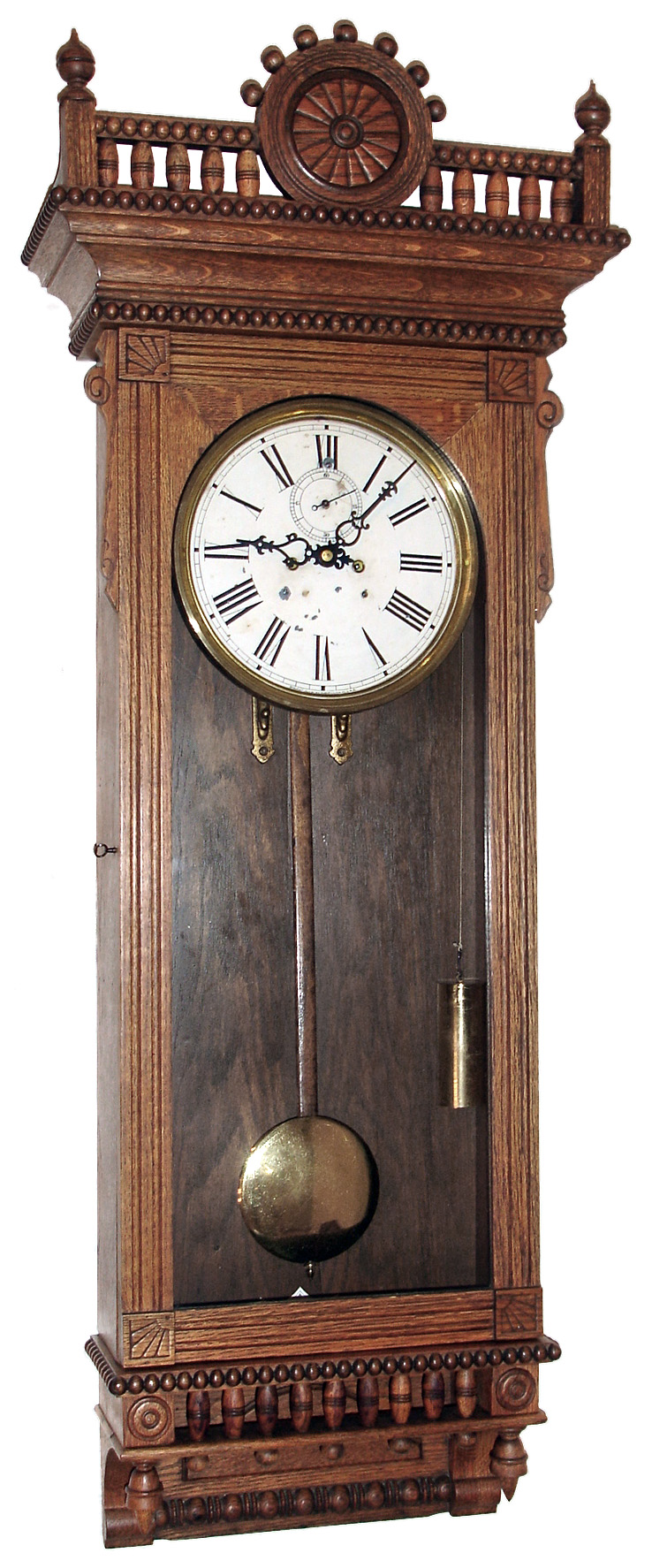 Waterbury Clock Co., Waterbury, Conn., "Regulator No. 53" wall clock, 8 day, time only, two weight driven movement in an oak case with painted metal dial, c1906 — Antique Clocks Price Guide