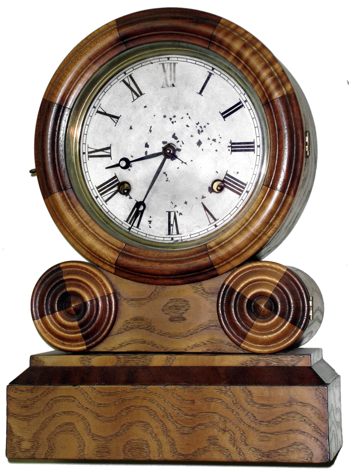 E. Ingraham, Bristol, Conn. "Grecian Mosaic" 8 day, time and strike walnut mantel clock, case front of walnut and ash, c1870 — Antique Clocks Price Guide