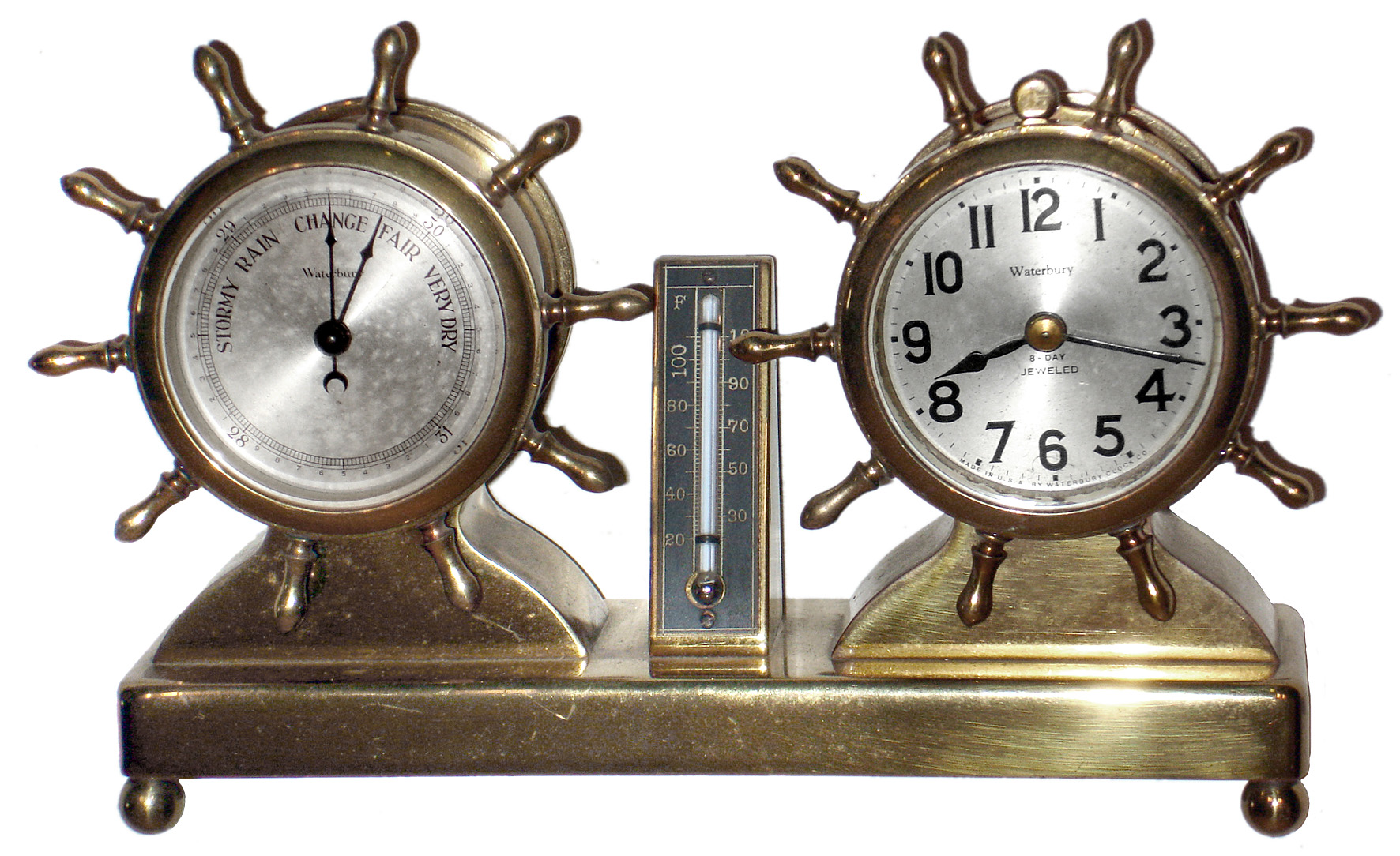 Waterbury Clock Co., Waterbury, Conn., "Commodore" brass set of 8 day, time piece and barometer, c1929 — Antique Clocks Price Guide