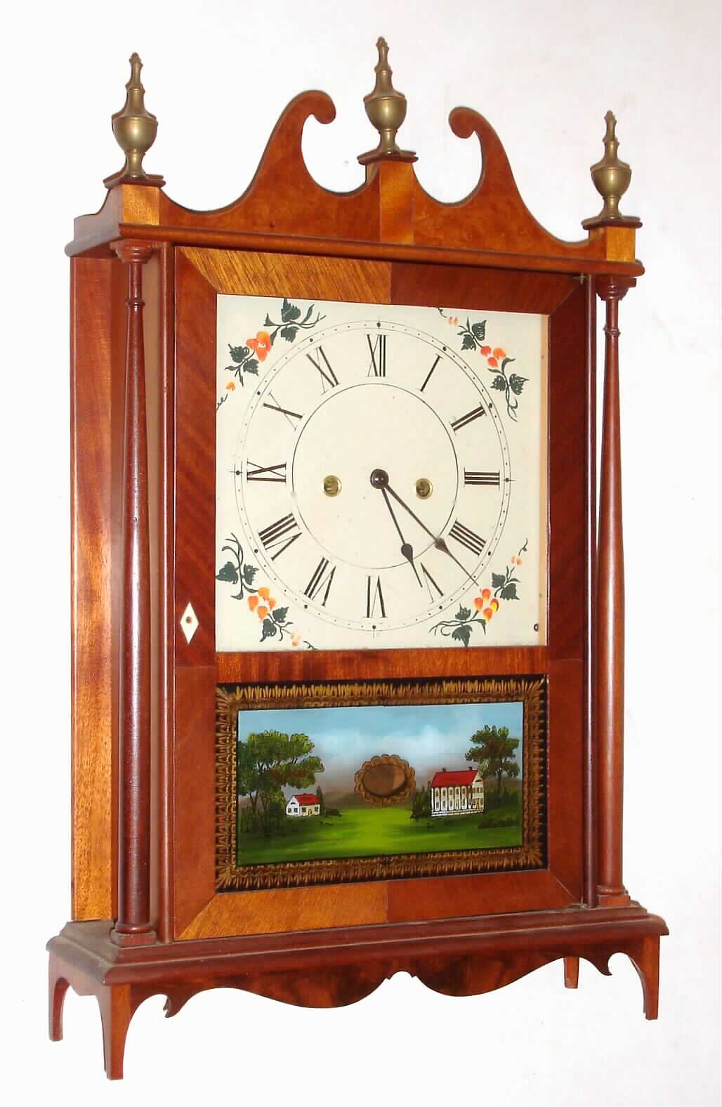 Unknown, 8 day, time and strike, brass movement hand made miniature pillar and scroll shelf clock, c1970.  Movement inside the case is a Welch Patty type that has been modified by moving the pendulum from behind the movement to the front. The movement has a strike train, but it appears to have not been used as there is no gong or bell for the hammer to strike. — Antique Clocks Price Guide