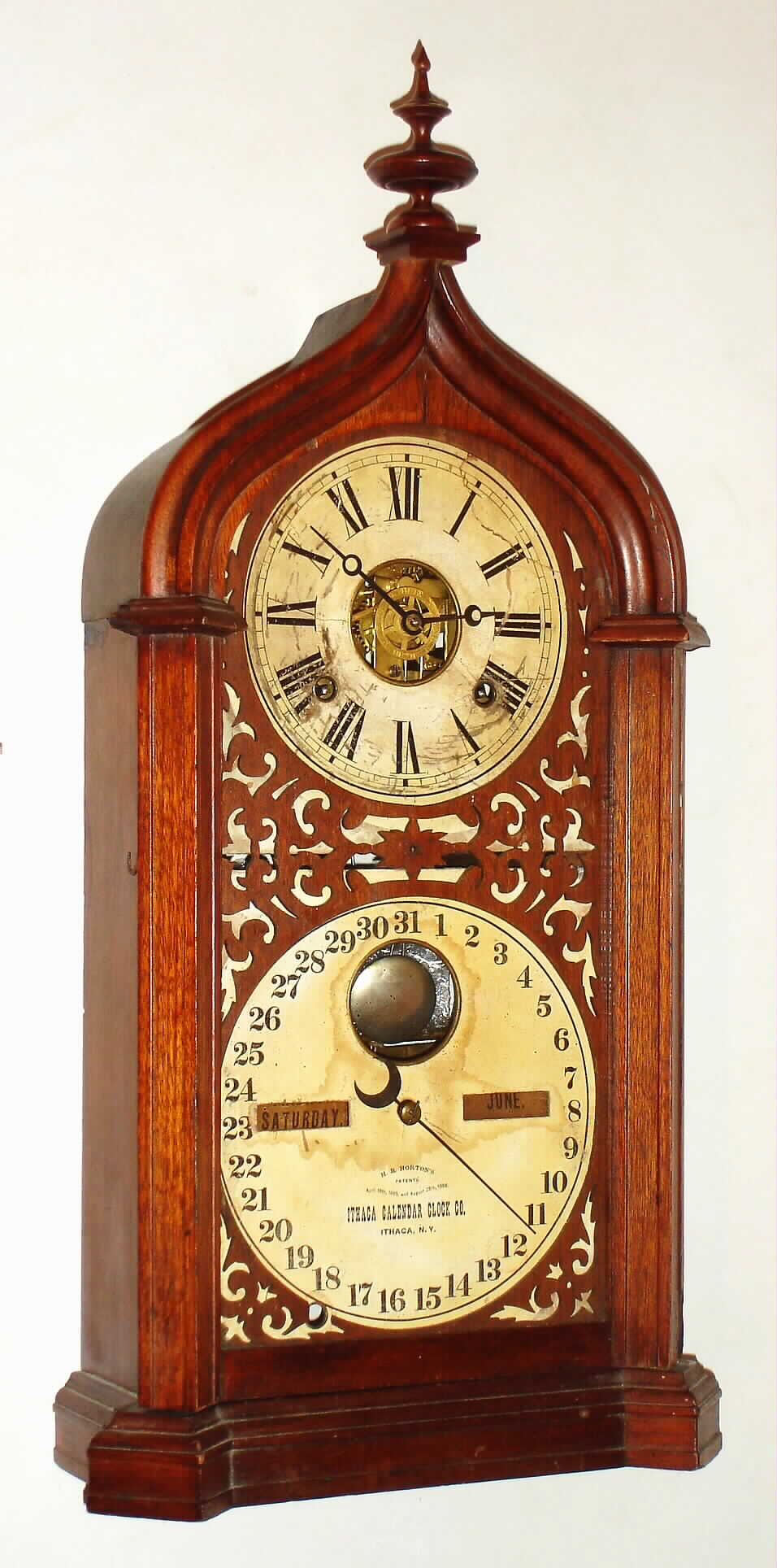 Ithaca Calendar Clock Co., Ithaca, NY, "Shelf Steeple", 8 day, time and strike, double dial calendar shelf clock, c1880. — Antique Clocks Price Guide