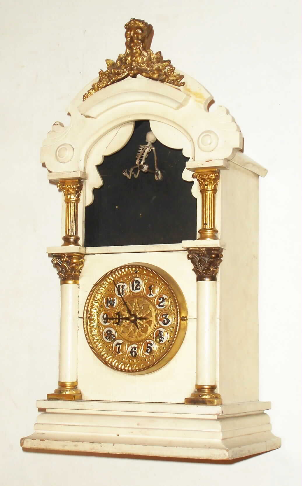New Haven Clock Co., New Haven, Conn., "The Mountebank", 8 day, time and strike, rare automaton "Dancing Skeleton" novelty clock, c1905 — Antique Clocks Price Guide