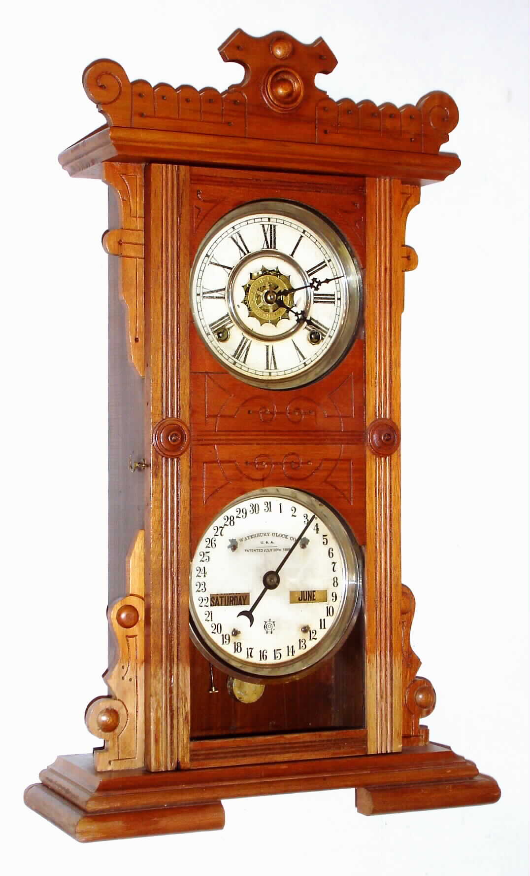 Waterbury Clock Co., Waterbury, Conn., "Calendar No. 44", 8 day, time and strike, double dial calendar clock, c1891. — Antique Clocks Price Guide