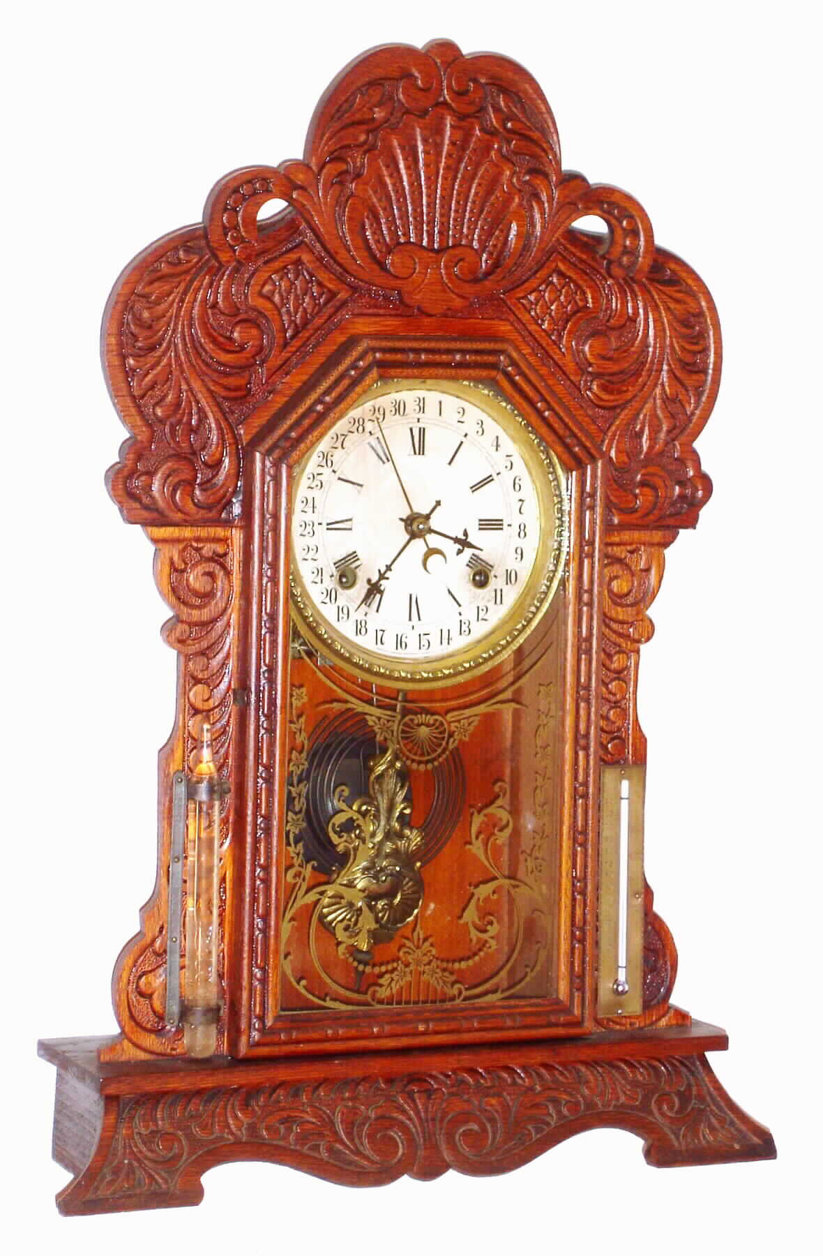 Waterbury Clock Co., Waterbury, Conn., "Dabney" oak 8 day, time, strike and calendar mantel clock, c1906 — Antique Clocks Price Guide
