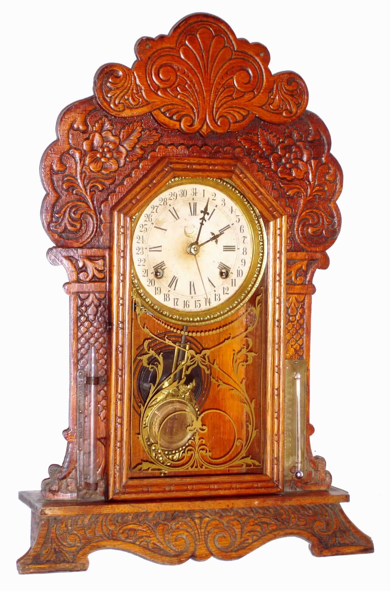 Waterbury Clock Co., Waterbury, Conn., "Dabney" oak 8 day, time and strike calendar mantel clock, c1912 — Antique Clocks Price Guide