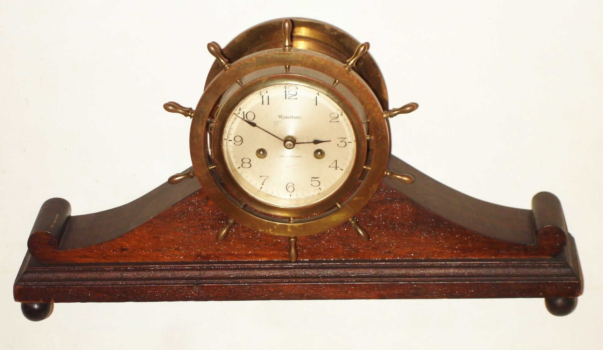 Waterbury Clock Co., Waterbury, Conn., "Ship's Bells No. 11" brass and mahogany 8 day, time and marine strike mantel clock, c1915 — Antique Clocks Price Guide